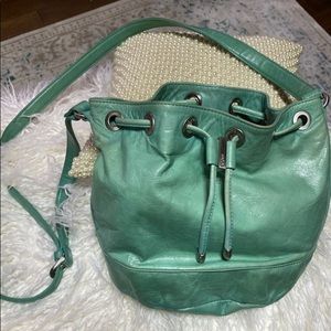 Hobo Tulia turquoise leather drawstring bag.